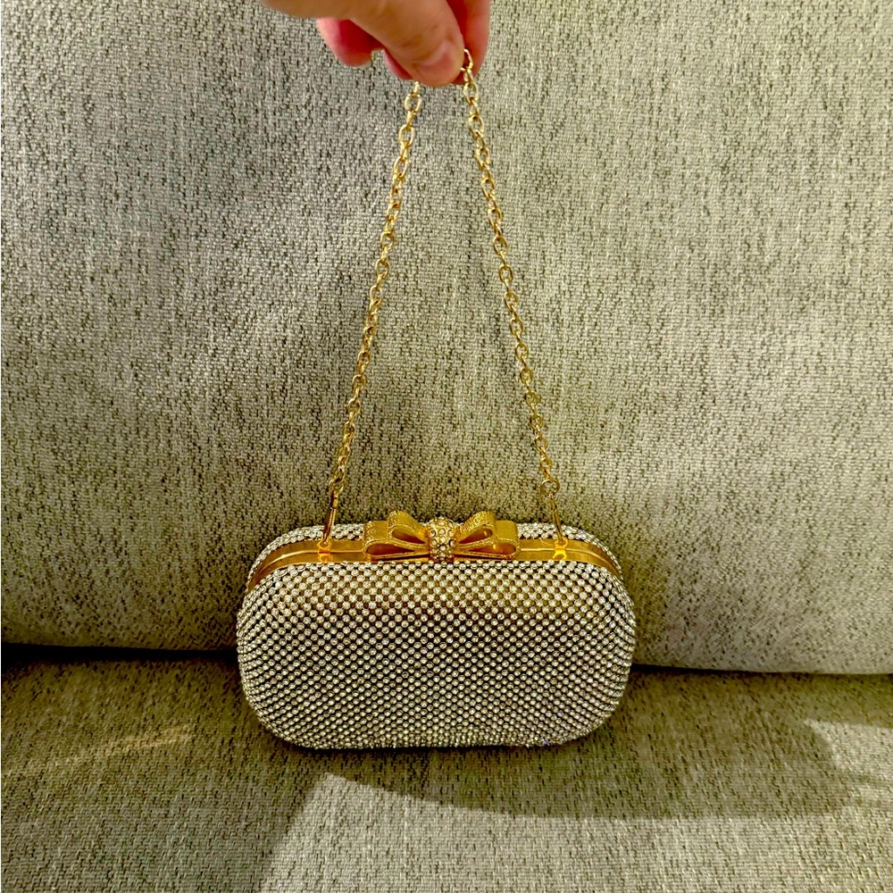 Beautiful gold sparkling clutch